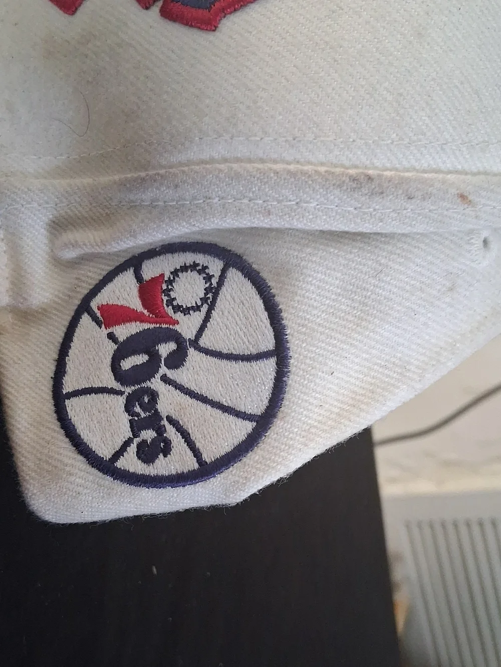 White Cny 76ers Baseball Cap with Red & Gold Embroidered Graphic